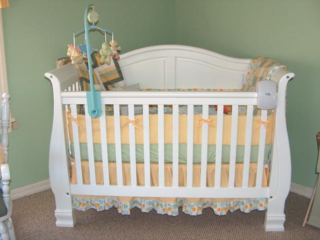 The crib's all ready, complete with bedding made with love by "Gammy!"