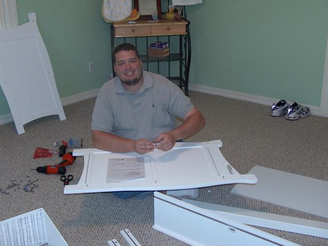 Putting together the changing table...