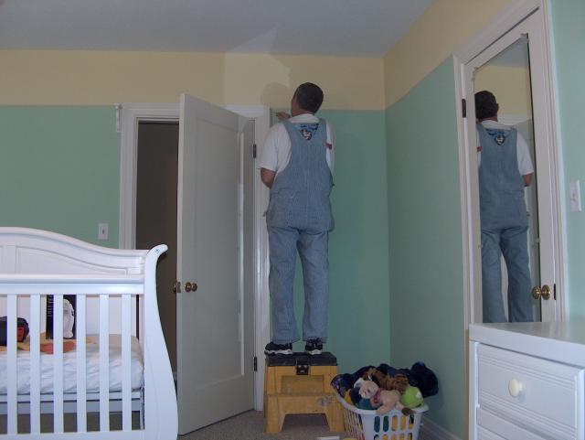 Getting started on hanging the shelves...