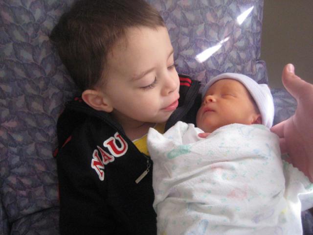 Tyler gets to hold Oliver (mostly) by himself!