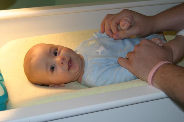 First diaper change of the day - Daddy usually does this one.