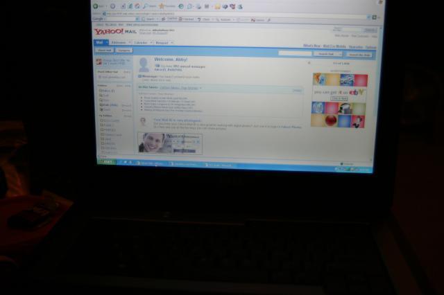 Checking email while Tyler finishes his bottle