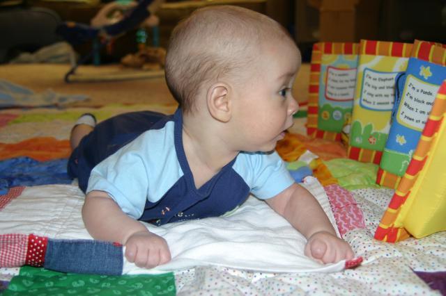 We love tummy time (as long as we have our panda bear to look at)!