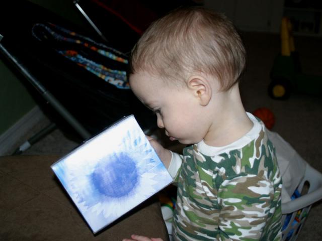 Empty Kleenex boxes make fun toys!