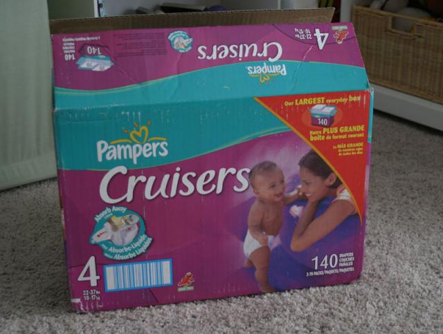 Unloading our diapers by the box -- they're much cheaper this way!