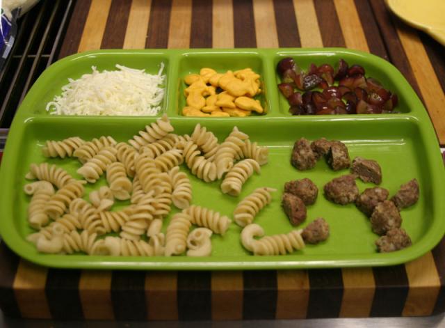 Tyler's lunch: noodles, meatballs, cheese, golfish and grapes!