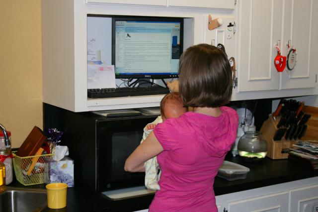 Checking email on the kitchen computer - yes, we have a computer in our kitchen
