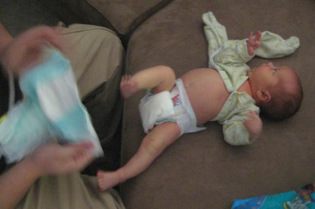 Nothing like changing a diaper right after lunch (it was mid-lunch for Oliver)