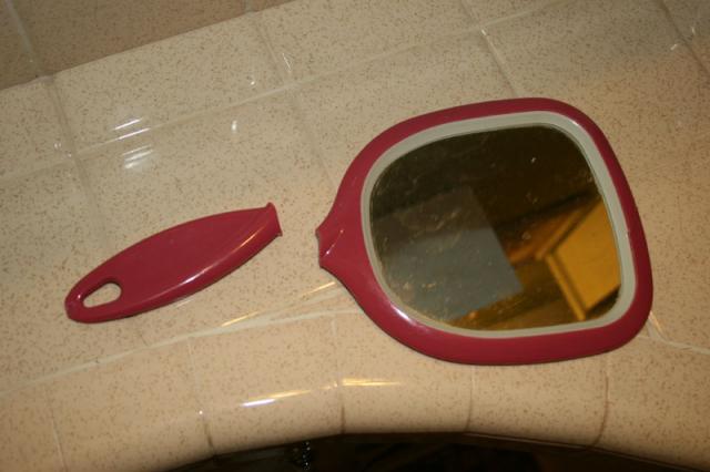 Oops, knocked my mirror off the bathroom counter. Is it still bad luck if the actual mirror part doesn't break?