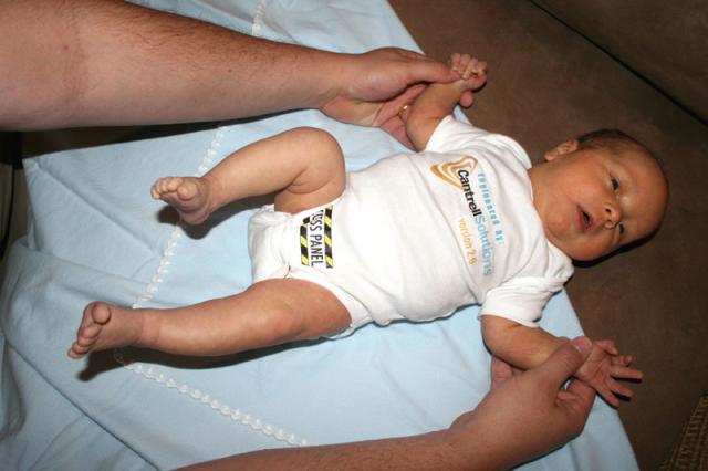 Showing off his onesie made by our good friends Greg & Ellen