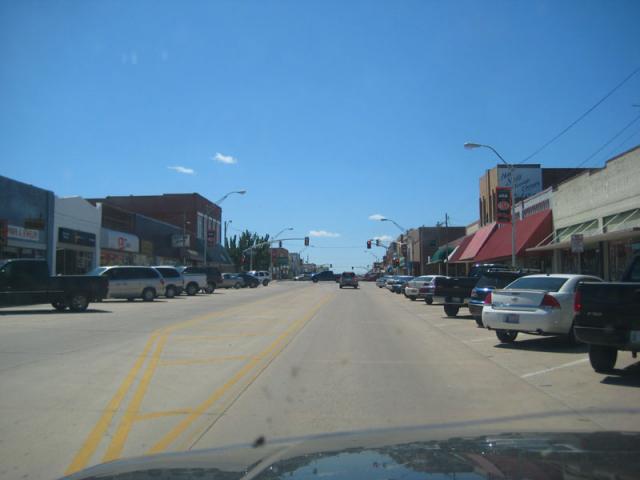 Headed down Main Street to deliver drinks to Jake's office