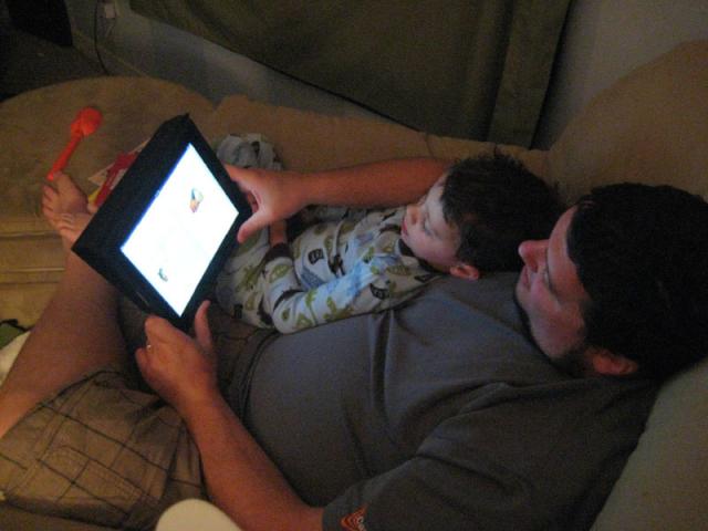 Reading his "big boy book" with Daddy (Don't worry, Coco, Jake actually has to read this one.)