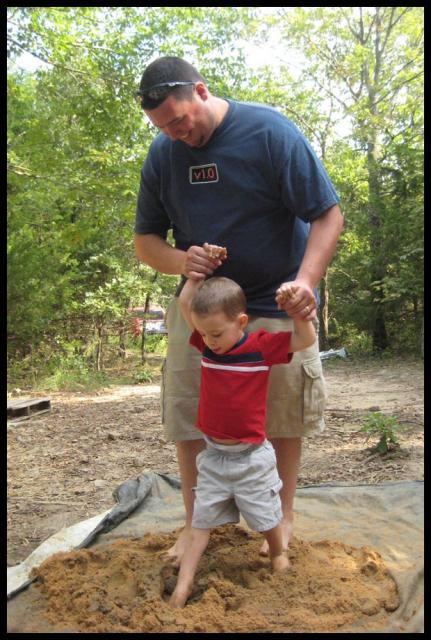 Pic of the Week ~ 9/21/08 (Mixing the mud at Brian & Hannah's)
