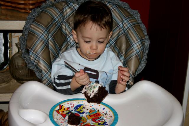 No, he didn't eat the whole cake -- we cut him a piece.