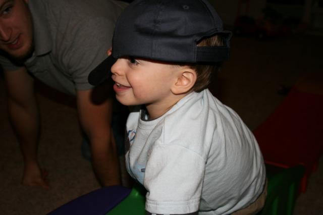 Trying on Uncle Dan's hat