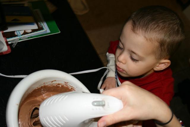 Helping with the cake