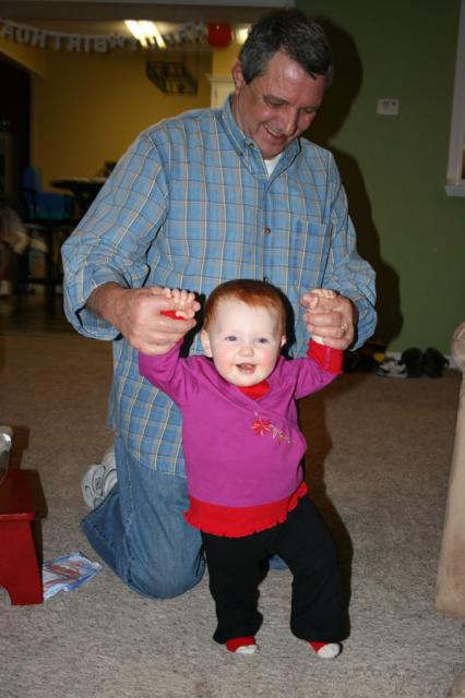 Papa walking baby Elyn