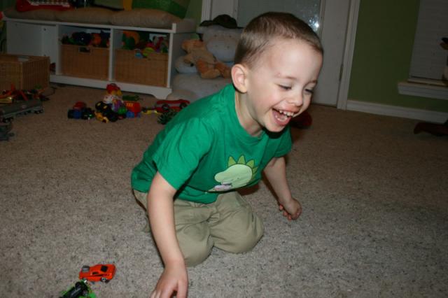 Looks like he's smiling, but he's really yelling, "No more pictures, Mama!"