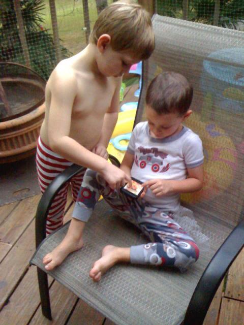 Jonathan and Tyler, playing the iPod