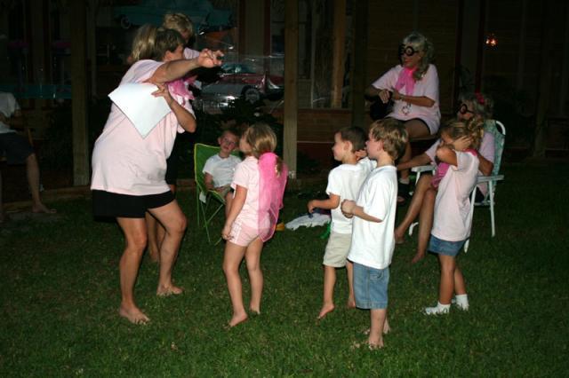 The petites sing the "12 Days of 60" to the birthday girls