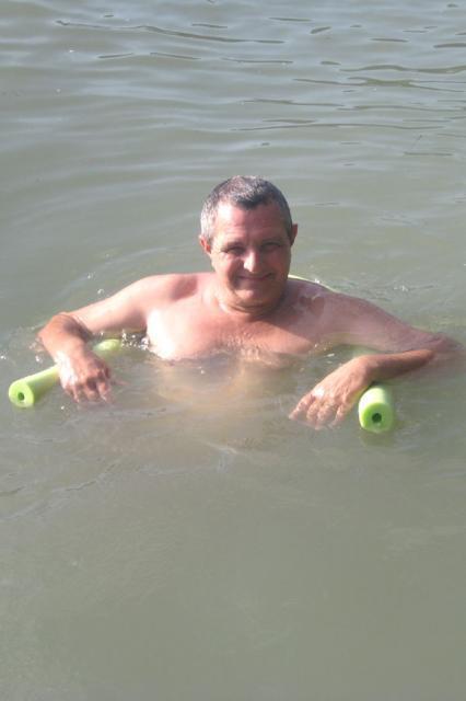 Papa relaxing in the river